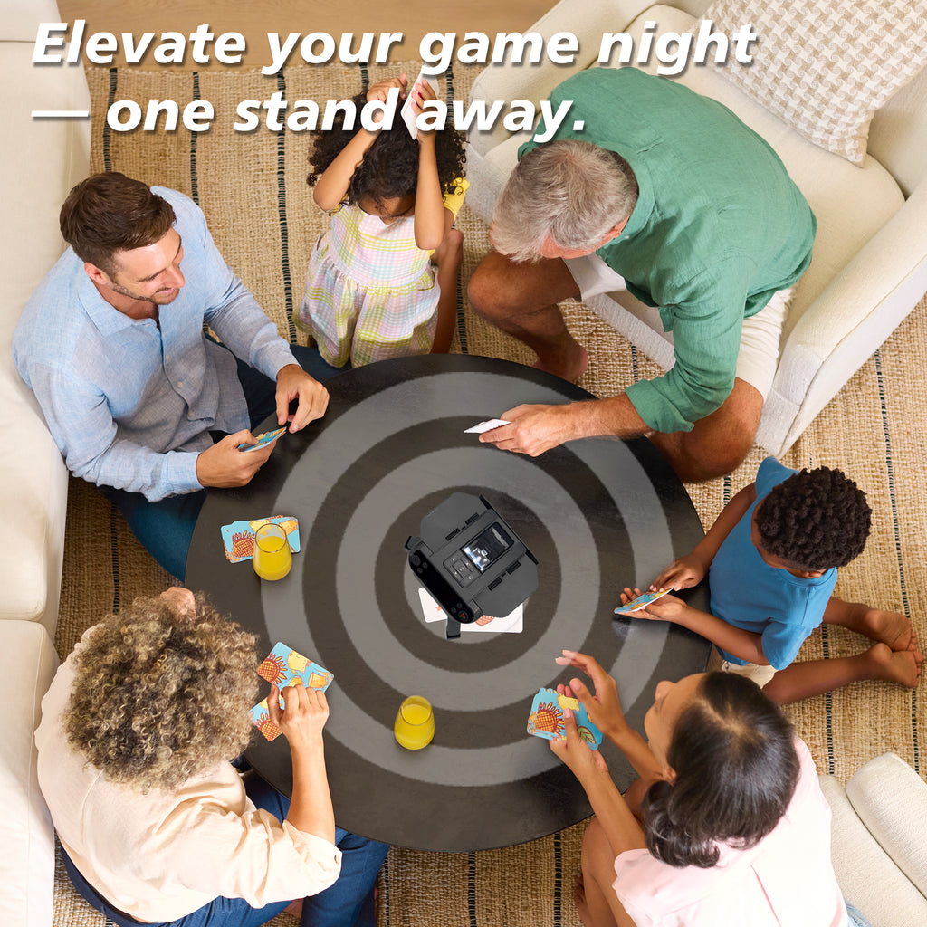 Family playing cards around a table with the MAX6 on its stand